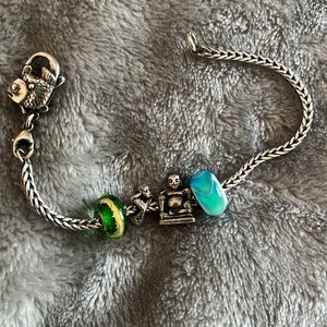Sterling silver Troll bracelet with charms.